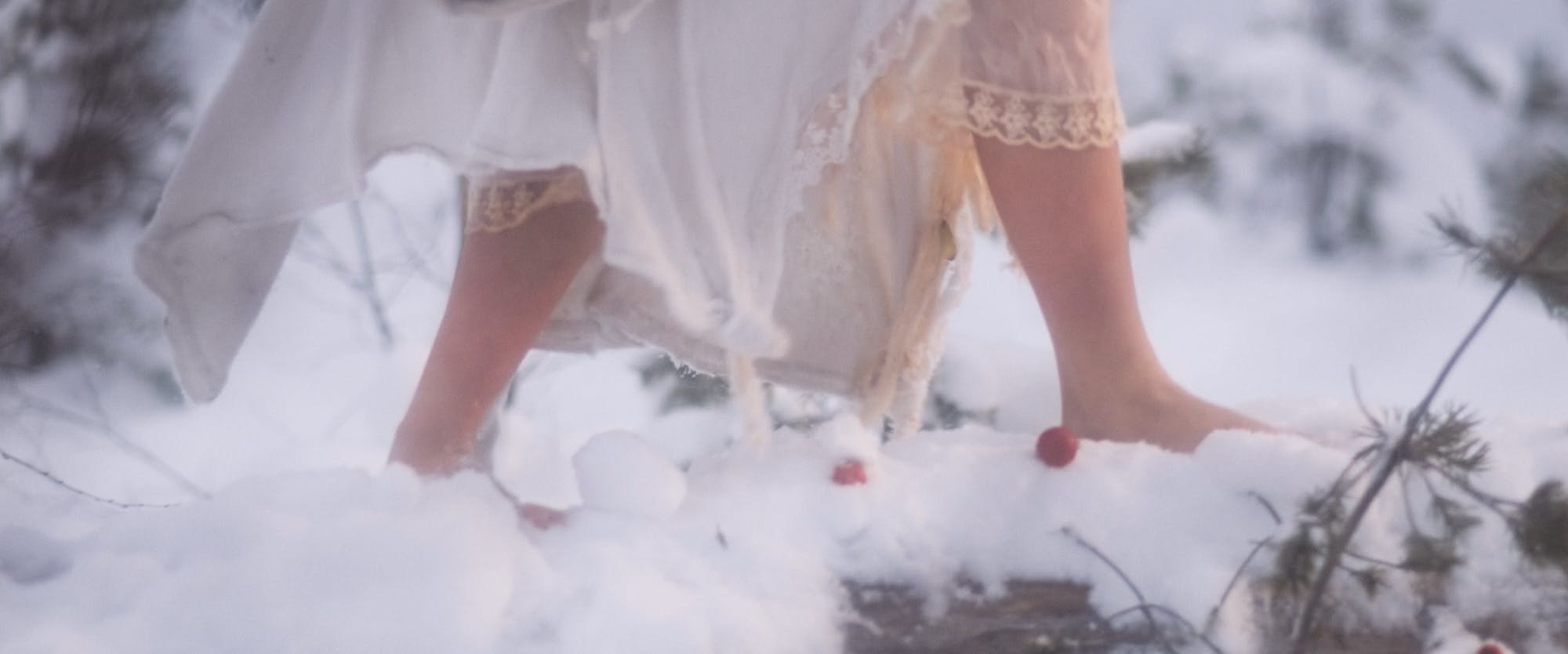 girl barefoot in snow