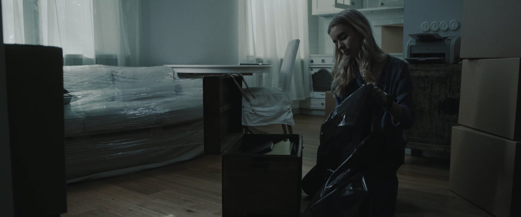 a young woman cleaning the room