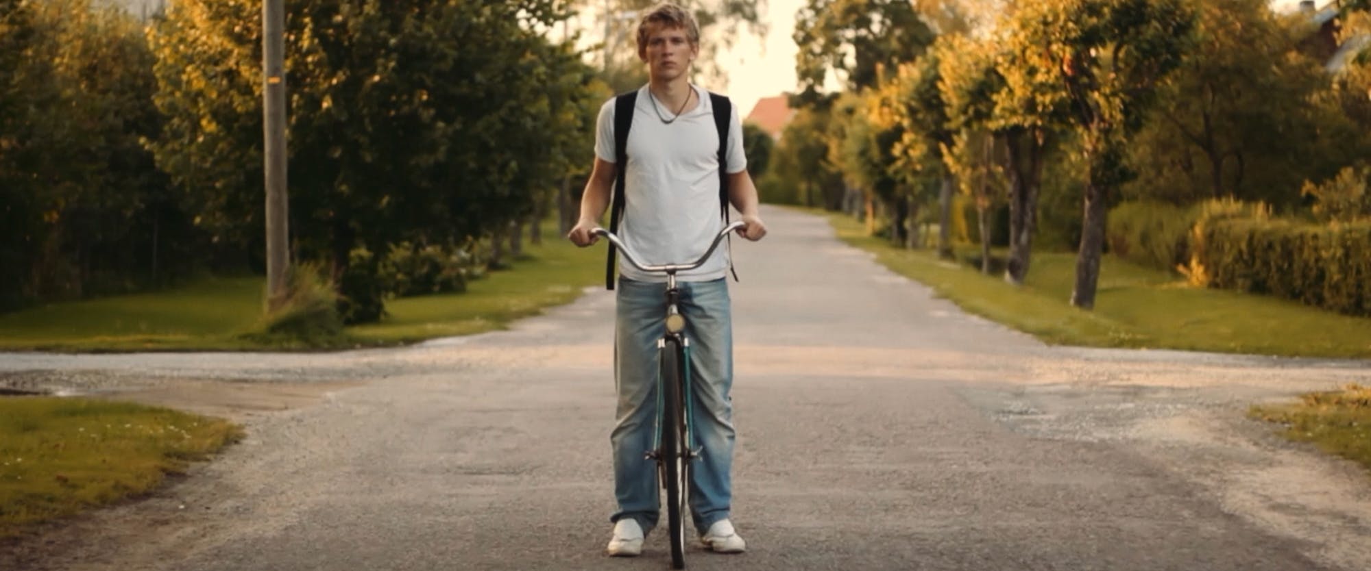 a young man on a bike